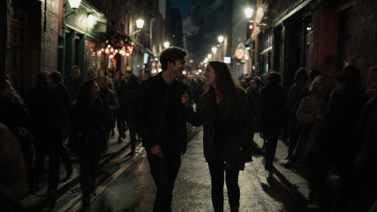 A couple exchanging a silent glance in a crowded London street after a night out, disappearing into an alley.