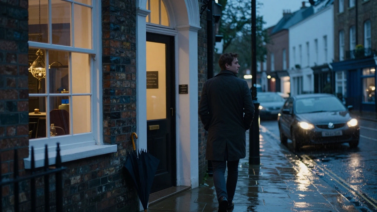 A man walks away from a hotel in Muswell Hill at dusk, looking back with calm reflection.