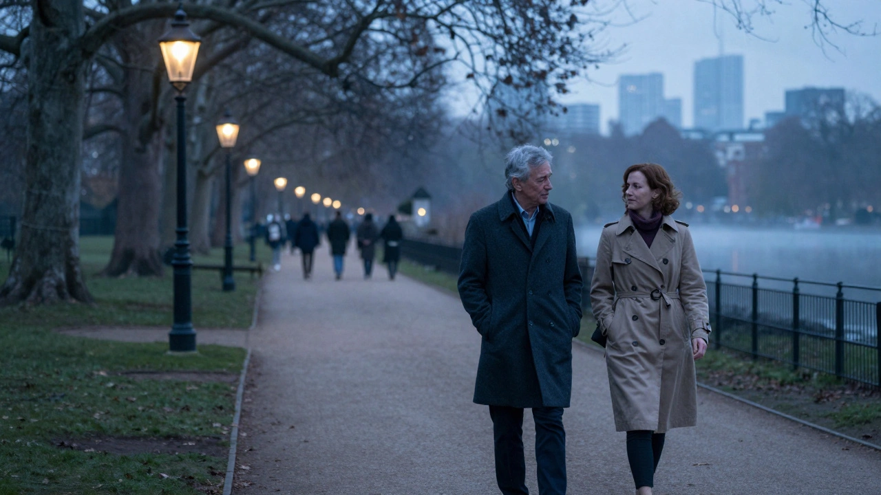 A pair walking peacefully through Hyde Park at dusk, lanterns glowing, city skyline in the distance.