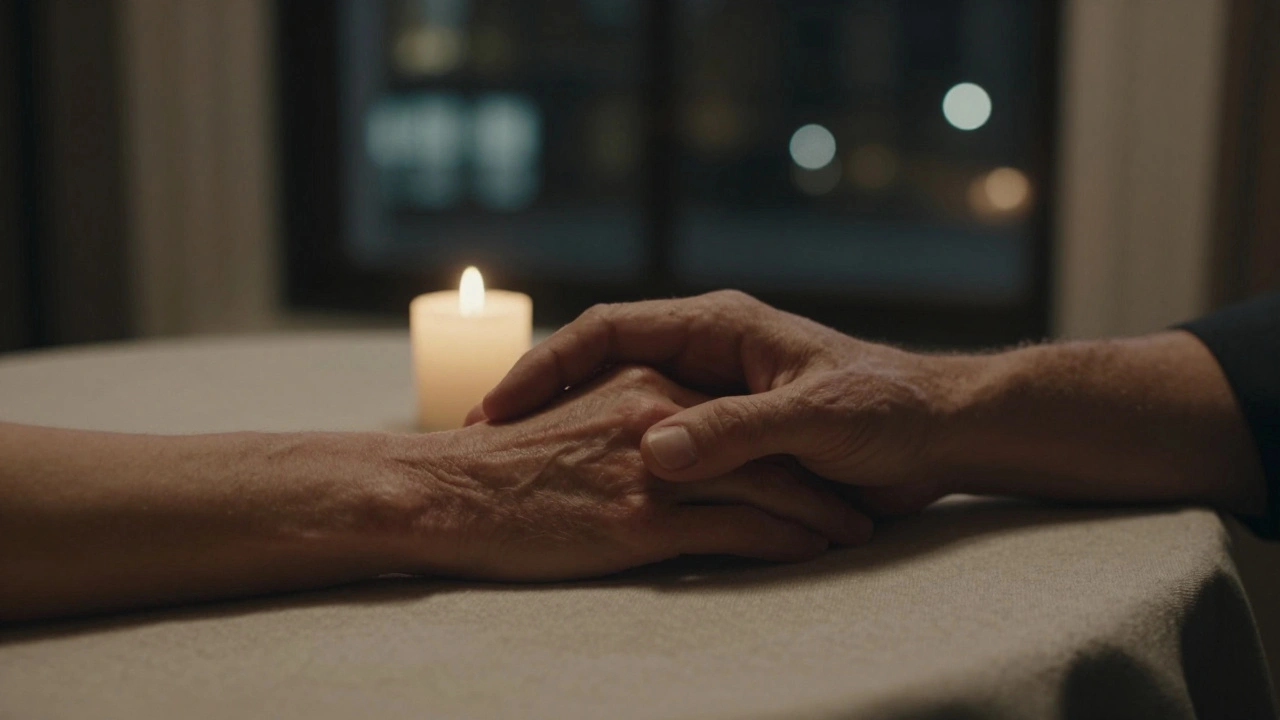 Two hands clasped gently on a table in a hotel room, candlelight casting a calm glow, symbolizing quiet human connection.